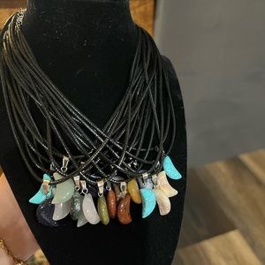 Moon shaped  crystals made into necklaces. Comes with customized colors.